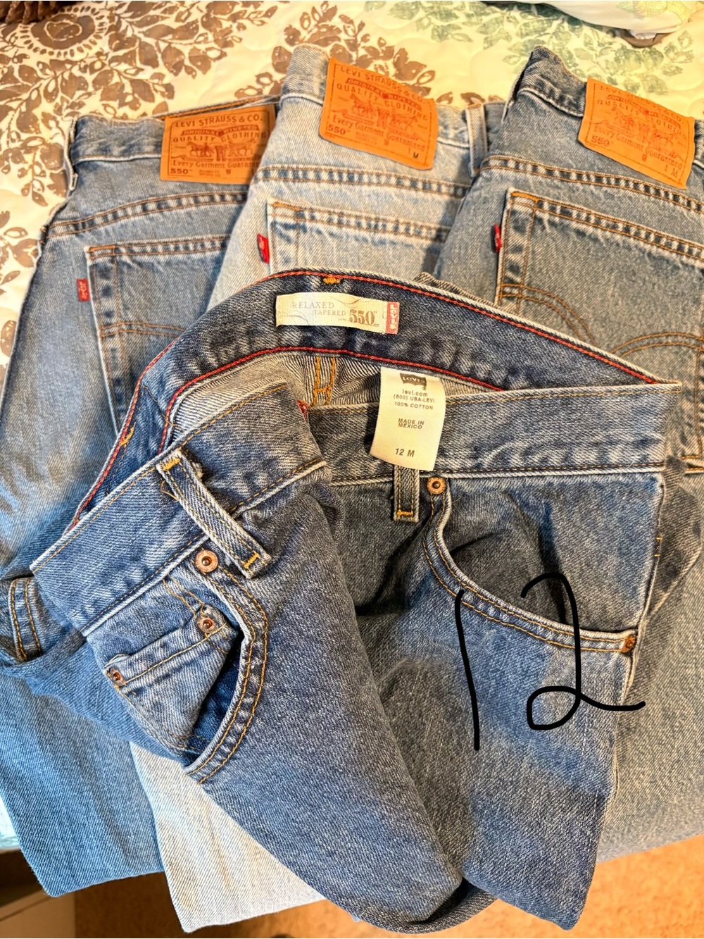 Levi's Women's Straight Leg 550 $40 each or $300 
Tops $5
Coats $10
Purse $10